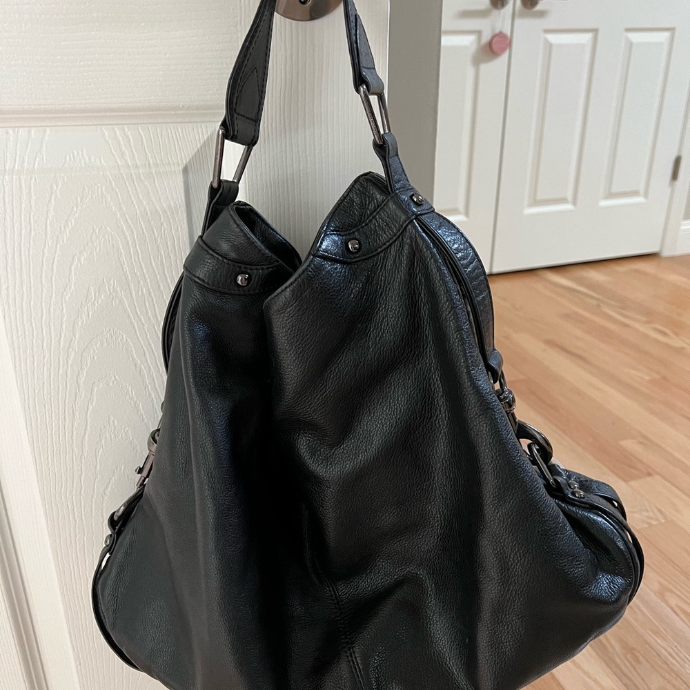 Rebecca Minkoff Nikki black leather hobo bag.